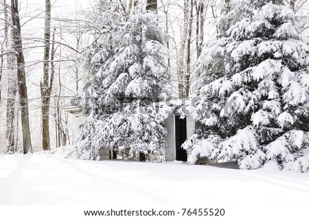 His and Her Outhouses for one-room school in a snow-covered landscape, Webster County, Wets Virginia, USA