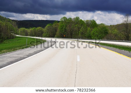 Traveling Route 33, Corridor H Freeway approaching storm, West Virginia, USA
