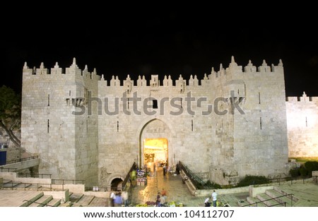 Damascus Gate entrance Old City Jerusalem Palestine Israel  night light long exposure motion blur faces