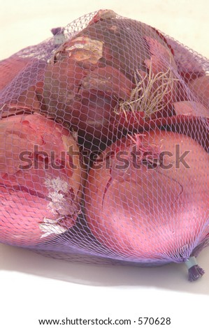 mesh bag filled with red onions
