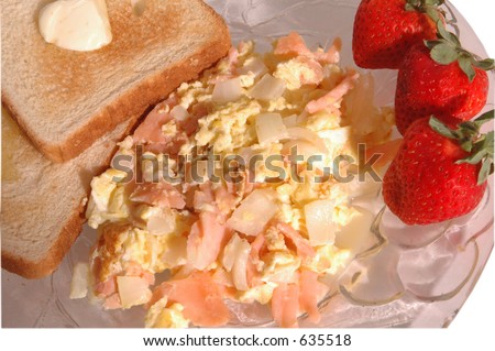 scrambled eggs with smoked salmon and onions toast and fresh strawberries
