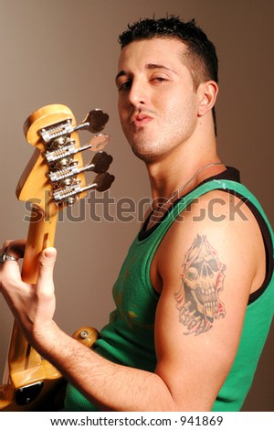 bass player with attitude and tattoo 