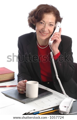 smiling business woman at desk