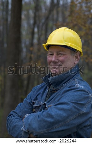 contractor handyman builder smiling confident happy on the job
