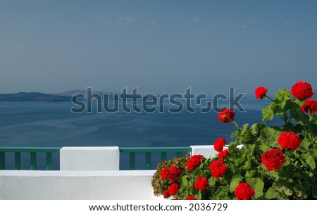 greek island santorini patio over the sea with flowers