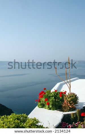 santorini greek islands stone patio with flowers and sea view aegean