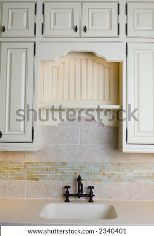 detail custom tile work kitchen faucet wall hot cold control handles