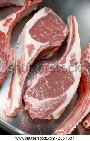 rib lamb chops meat prime cut in frying pan to be cooked