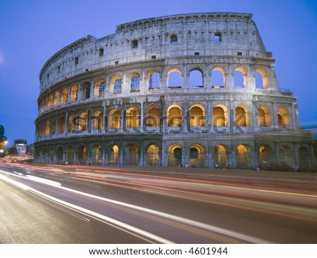 colosseum rome italy night time with car light streaks tourists coliseum collosseum