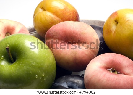 granny smith green apple with pluots and donut flat chinese saucer peach black plums