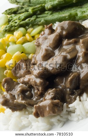 angus beef burgundy cubes with gravy white rice asparagus spears and succotash corn and lima beans