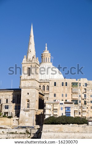 view historic buildings grand harbor three cities senglea vittoriosa  cospicua and st. john\'s cathedral grand master\'s palace valletta malta europe mediterranean