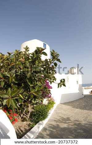 greek island cyclades architecture house with plants and flowers mediterranean sea view santorini oia