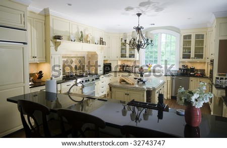 Luxury Home Modern Custom Kitchen With Wine And Baguettes On ...
