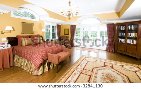 luxurious master bedroom with king size bed and beautiful window light