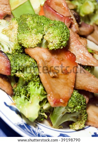 chinese restaurant food dish of roast pork slices with mixed vegetables