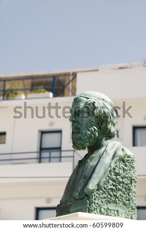 statue Hermes in Ormos harbor Ios Greek island Cyclades