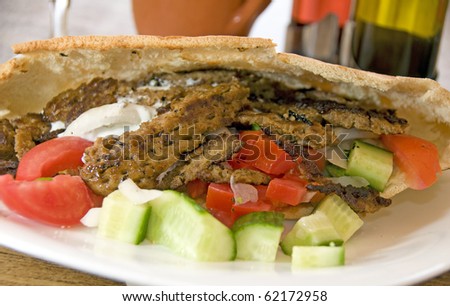 pork pita donner kebab sandwich as prepared photographed in Larnaca Cyprus