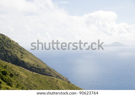 Saba  Netherlands Antilles mountain cliff view of Sint Eustatius in distance Caribbean Dutch island
