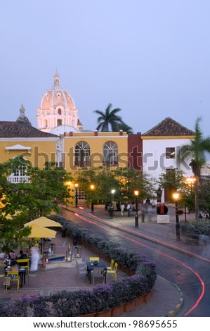 night scene car light streaks  of square restaurant Naval Museum Iglesia Church of Santo Domingo Cartagena de Indias Colombia South America