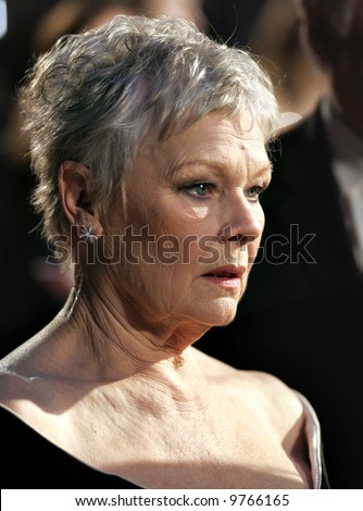 Actress Dame Judi Dench arrives at The Orange British Academy Film Awards at the Royal Opera House on February 11, 2007 in London, England.