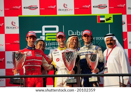 DUBAI, UAE - JANUARY 25-26 2008: Podium of the round 1, race 1 of GP2 Asia at Dubai Autodrome. In the first session Romain Grosjean was the champion.