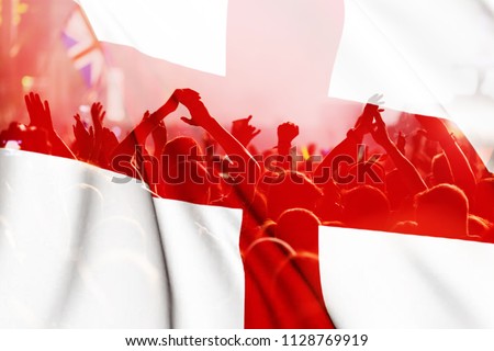 england supporters - double exposure of England flag and football fans celebrating victory