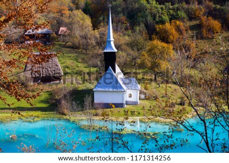 Flooded and abandoned church in the middle of a lake contaminated with cyanide at Geamana, near Rosia Montana, Romania.