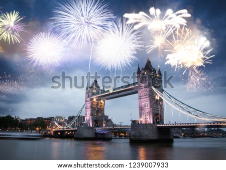 celebratory fireworks over Tower Bridge - New Year destination.  London.  UK