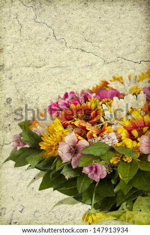 Bouquet of wild flowers on vintage background