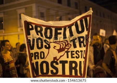 CLUJ - SEPT 15: People join a protest against the Romanian Government that passed a law allowing the gold extraction project at Rosia Montana. On Sept 15, 2013 in Cluj, Romania