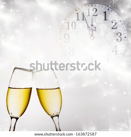 Champagne Glasses, Clock And Fireworks At Midnight