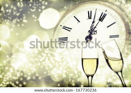 Vintage Photo Of Glasses With Champagne Against Holiday Lights And Clock Close To Midnight