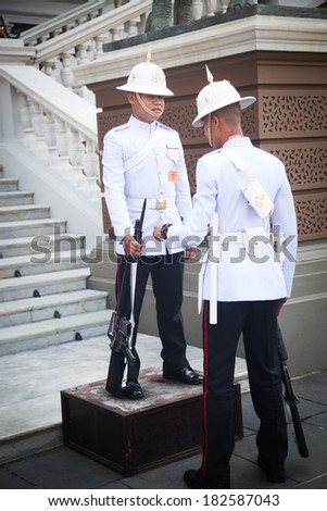 BANGKOK - JANUARY 21: Parade of the kings Guards, in the Grand Palace, Changing the Guard on January 21, 2014 in Bangkok, Thailand, Grand Palace