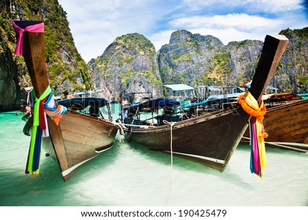 Thailand ocean landscape. Exotic beach view and traditional ship in Maya Bay, Ko Phi Phi Don