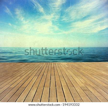 Vintage holiday background - perfect sky and water of ocean