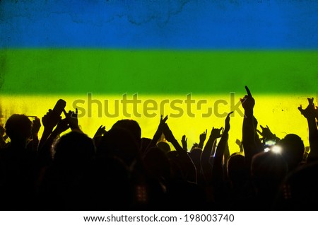 Cheering crowd and the colors of the Brazil flag - vintage photo