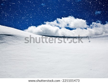 Background of cold winter landscape with snow, blue sky and sunlight