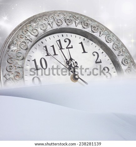 New Year\'s at midnight - old vintage clock and holiday lights