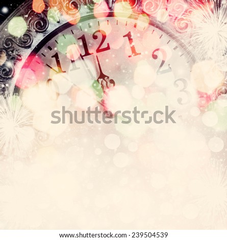 New Year\'s at midnight - clock on bokeh background