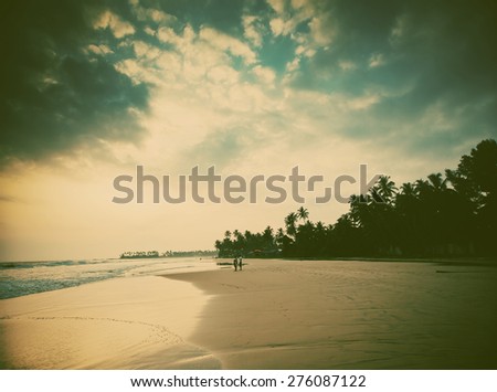Sunset on tropical beach -retro style background