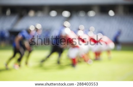American football game - out of focus background