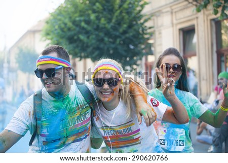 CLUJ-NAPOCA, ROMANIA - JUNY 13, 2015 : Unidentified people at the Cluj-Napoca Color Run on Juny13, 2015. The Color Run is a 5k worldwide hosted fun race.