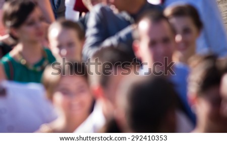 Crowd of people at a gathering - out of focus image