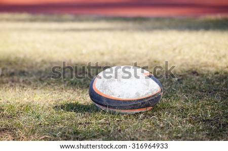 Rugby players fighting for ball - sports concept, retro style photo