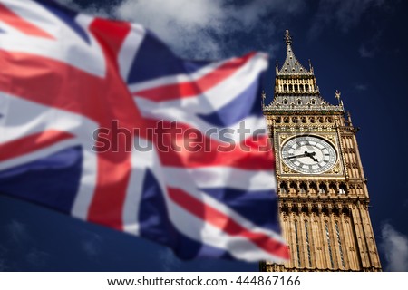 British union jack flag and Big Ben Clock Towe at city of Westminster in the background