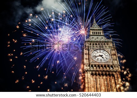 Explosive fireworks display fills the sky around Big Ben. New Year\'s Eve celebration background