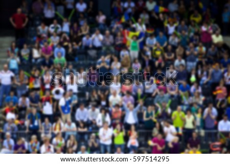 blurred background of crowd of people in a sports arena