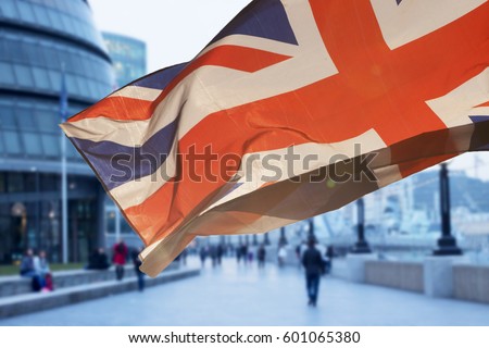 brexit concept - British Union Jack flag and symbols of London in the background - UK votes to leave the EU