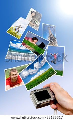Digital camera and photographs against blue background Digital camera and photographs against blue background